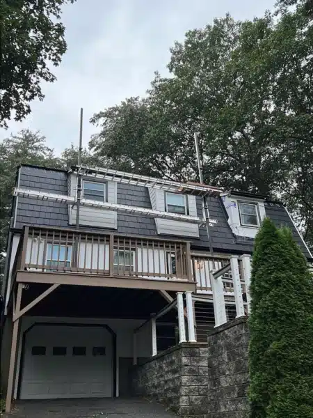 Roof and siding replacement in Byfield MA, Essex County, featuring GAF asphalt shingles and James Hardie siding installed by Coastal Windows & Exteriors