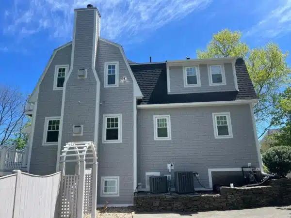 Gray Hardie shake siding installed in Danvers MA, Essex County, by Coastal Windows & Exteriors for a weather-resistant, low-maintenance North Shore home transformation