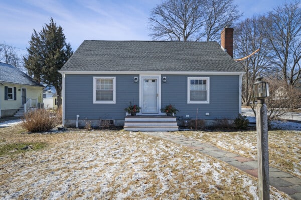 James Hardie Cedarmill siding in Boothbay Blue with energy-efficient vinyl windows installed by Coastal Windows & Exteriors on a North Shore MA home