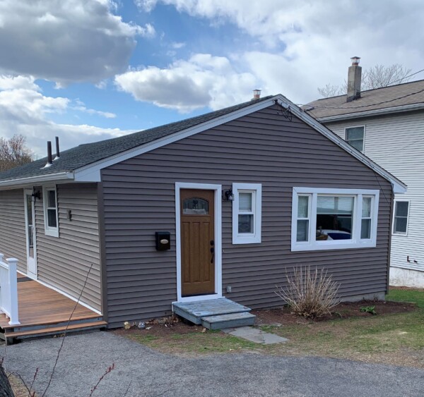 Full siding and roof remodel in Waltham MA, Middlesex County, by Coastal Windows & Exteriors, enhancing weather protection, energy efficiency, and curb appeal