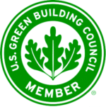 Green circular logo with the words U.S. Green Building Council Member surrounding a graphic of a three-leaf plant.