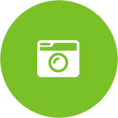 A green circle with a white icon depicting a minimalist camera.