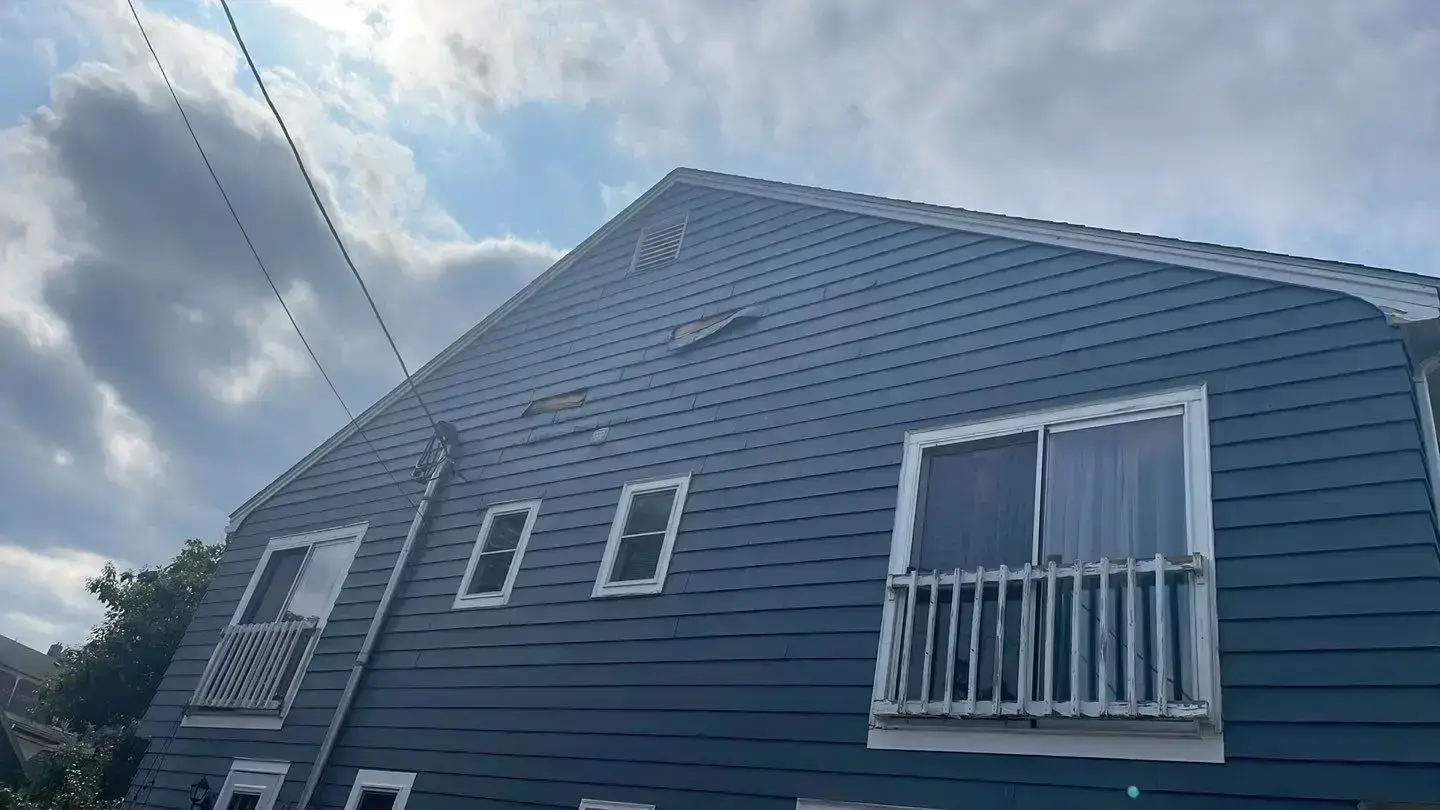 Vinyl Siding Storm Damage. summer exterior home remodeling. summer exterior home remodeling