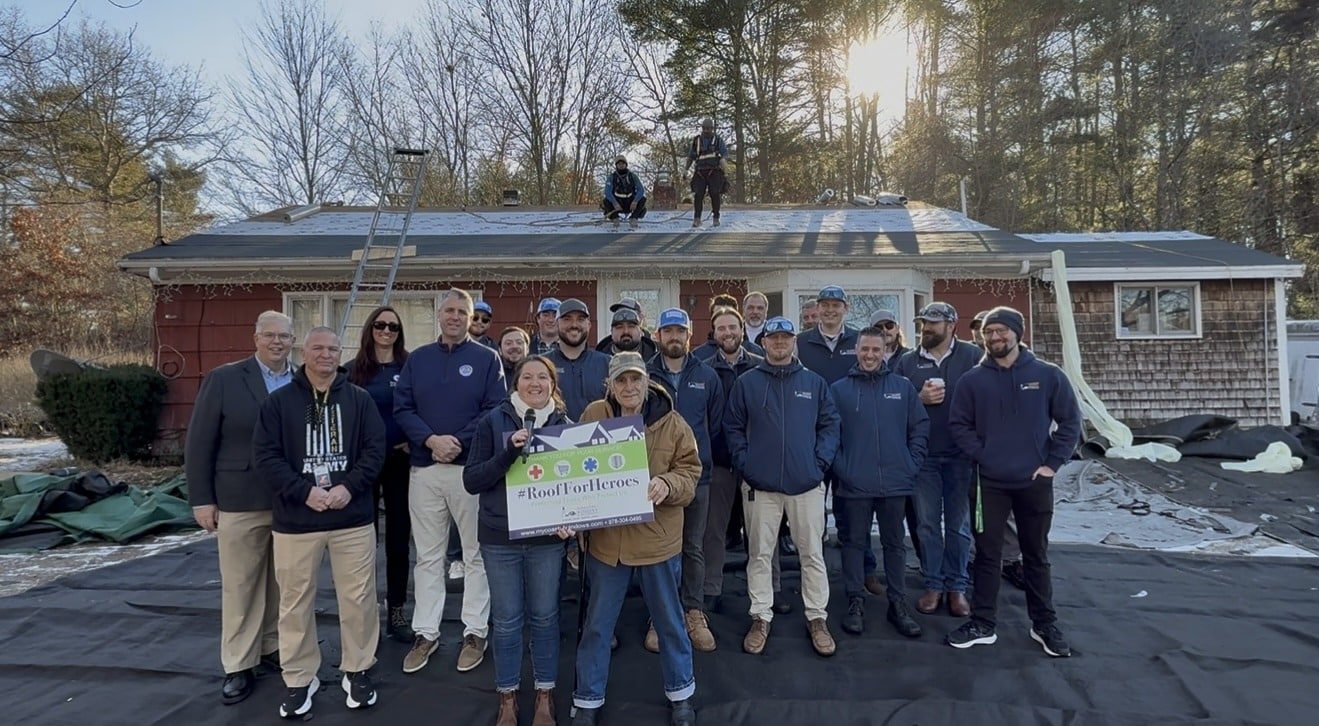 Coastal Windows & Exteriors roofing crew installs a new roof for a hero in Hopedale MA.