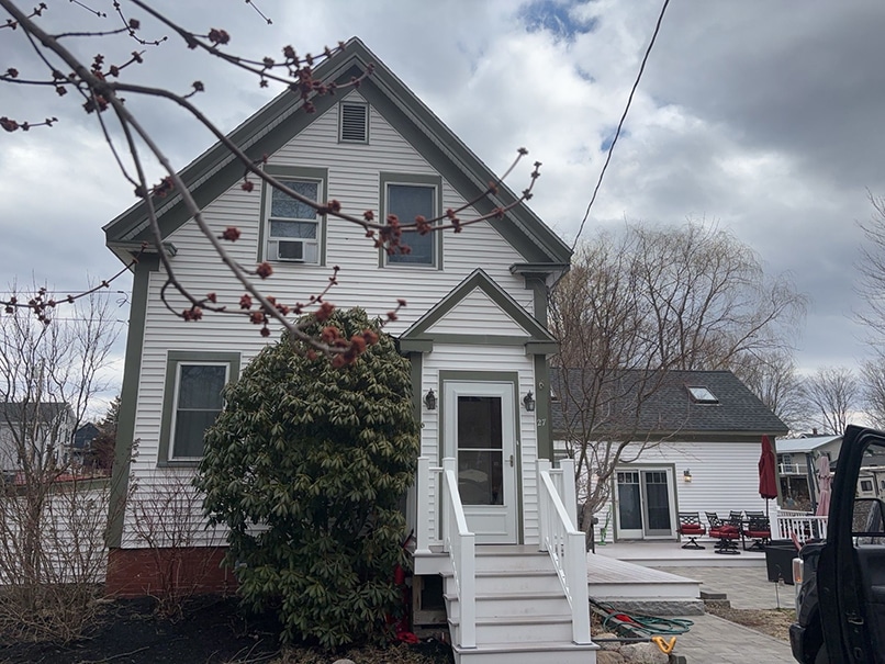 Worn siding before replacement during an Exterior remodeling sale in the North Shore territory.