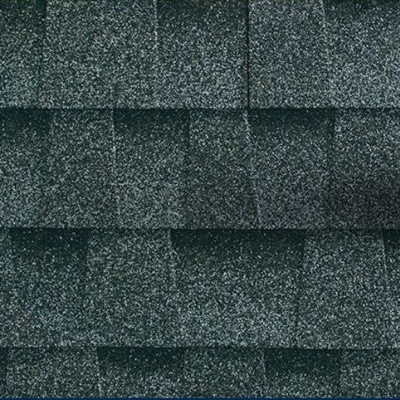 Close-up of asphalt shingles used in roofing faq about roof materials and durability.