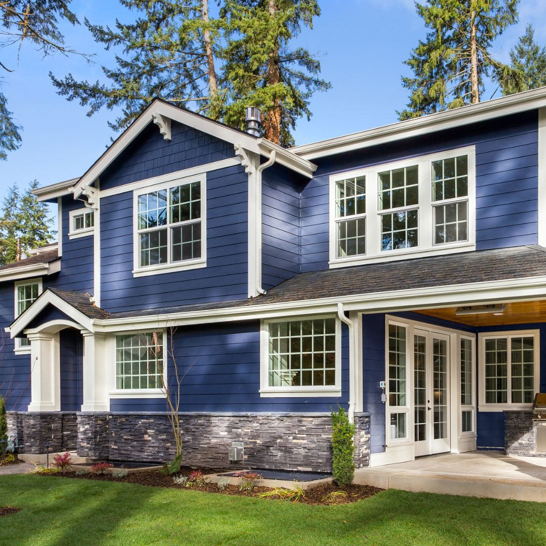 Blue home with updated windows featured in windows faq guide.
